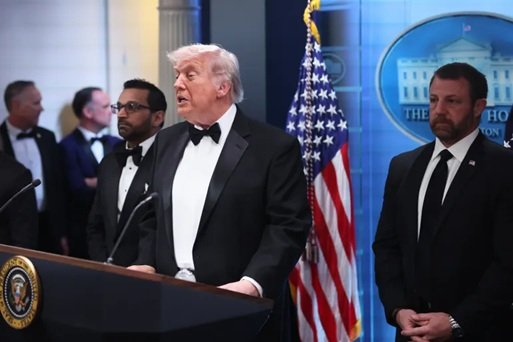 Security personnel evacuate guests as shots are reported near White House Correspondents’ Dinner in Washington, D.C., with President Donald Trump moved to safety.