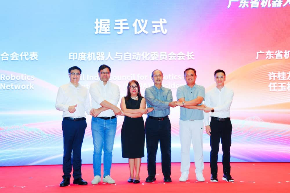 Raj Sharma, President of AICRA, with representatives from India, China, Singapore, Malaysia, Thailand, Taiwan, and other Asian countries during an international robotics collaboration meeting focused on ecosystem development, technology transfer, and industry partnerships.